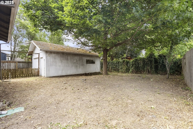 3003 SE 58th Ave, Portland, OR 97206 - fenced backyard featuring an outbuilding
