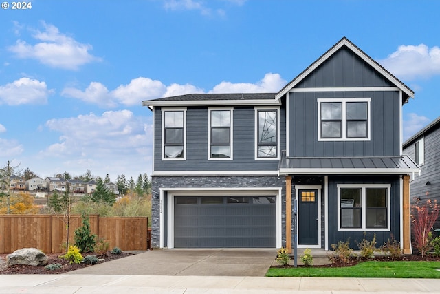 view of front of property with a garage