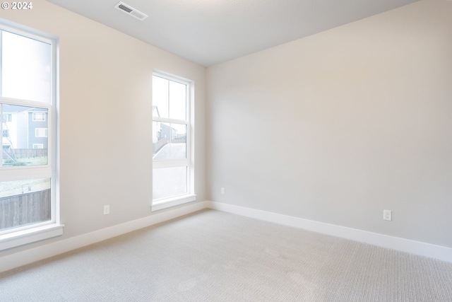 view of carpeted spare room