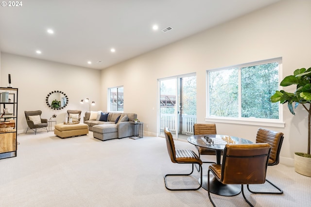 view of carpeted dining area