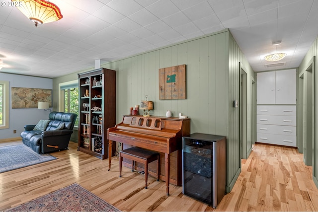 72794 Shoestring Rd, Cottage Grove, OR 97424 - hallway with beverage cooler and light wood-type flooring