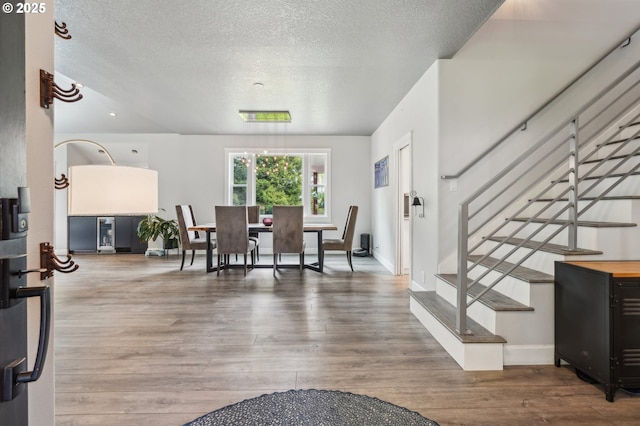 12875 Peggys Pl, Hubbard, OR 97032 - interior space with stairway, a textured ceiling, and wood finished floors