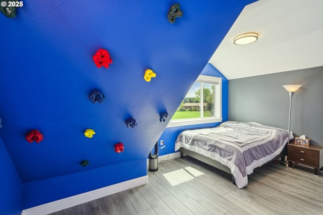 12875 Peggys Pl, Hubbard, OR 97032 - bedroom featuring baseboards, wood finished floors, and lofted ceiling