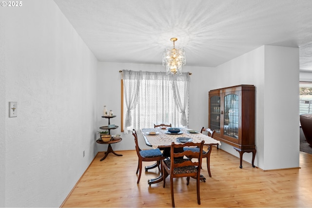 814 SW 44th St, Pendleton, OR 97801 - dining space featuring a chandelier and light wood finished floors