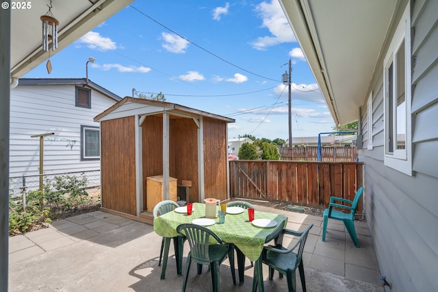 814 SW 44th St, Pendleton, OR 97801 - view of patio with a storage shed and outdoor dining area