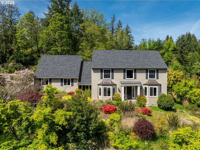 view of front of home featuring a standing seam roof and metal roof