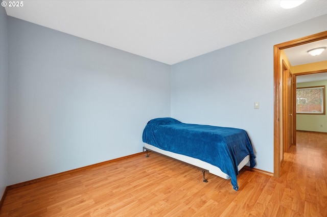 bedroom featuring light hardwood / wood-style floors