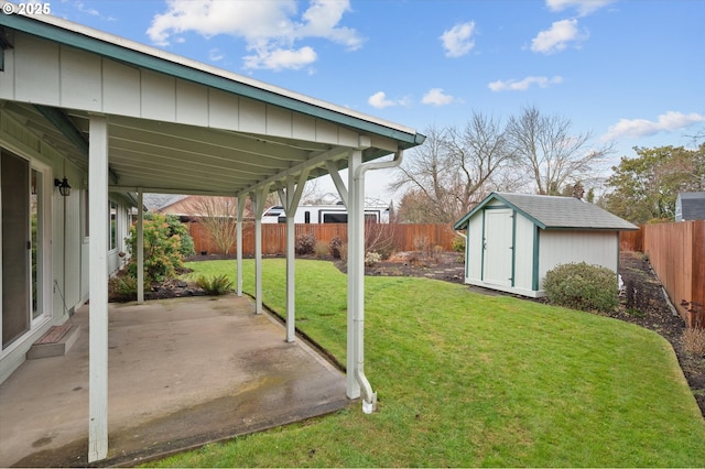 view of yard with a patio area and a shed