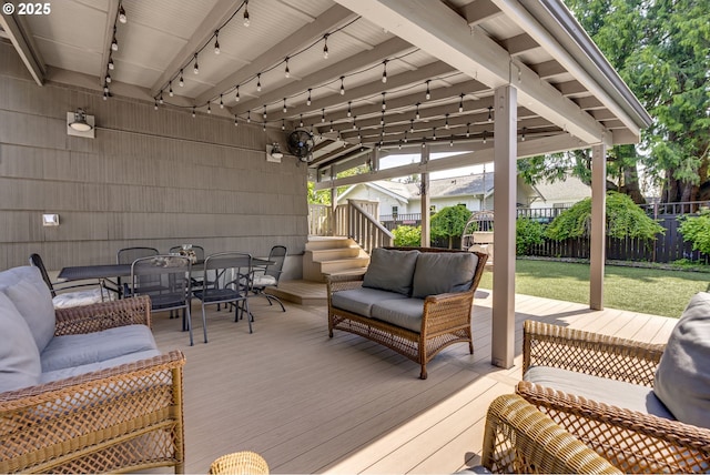 deck with fence, stairs, outdoor dining area, and outdoor lounge area