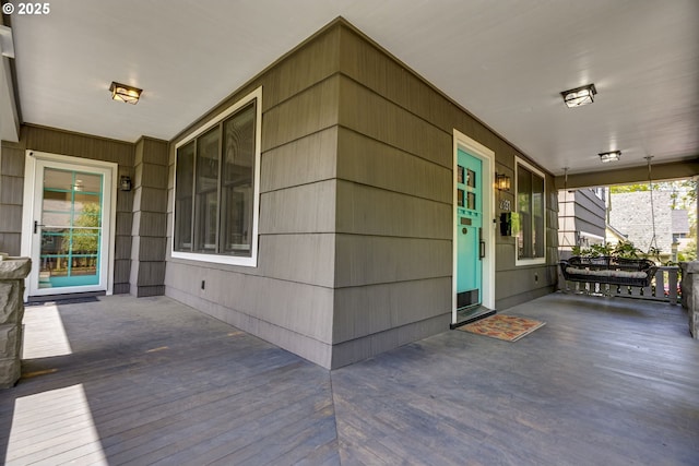 wooden deck featuring a porch