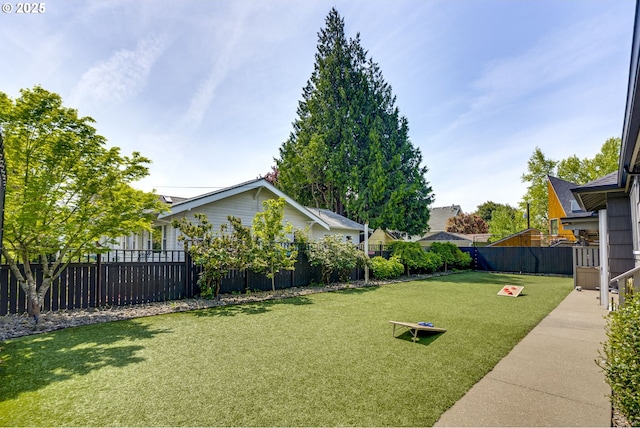 view of yard featuring a fenced backyard
