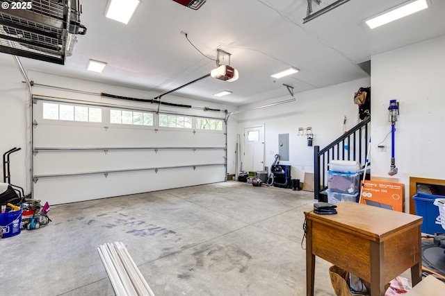 garage featuring a heating unit, a garage door opener, and electric panel