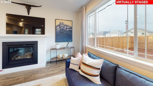 living area featuring hardwood / wood-style floors