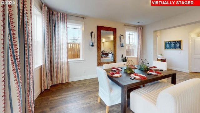 dining room with hardwood / wood-style floors