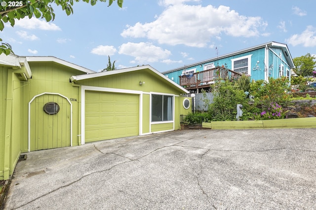 garage featuring driveway