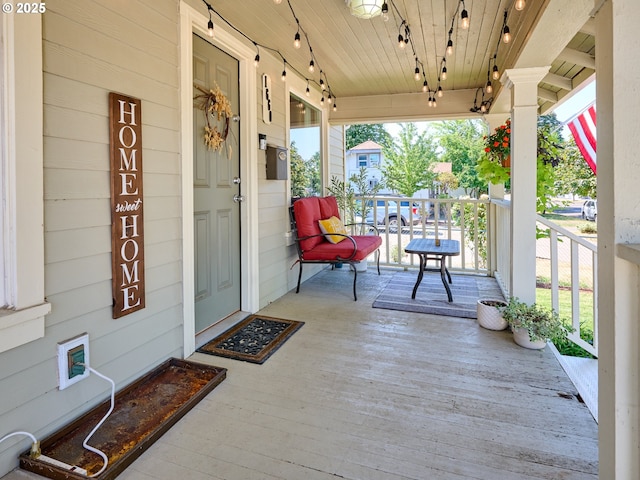 view of patio featuring a porch