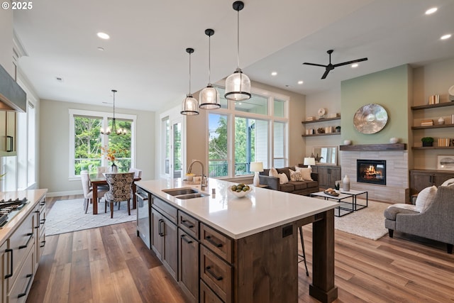 1825 NW Tanner Ct, Camas, WA 98607 - kitchen with a sink, dark wood-style floors, a ceiling fan, light countertops, and recessed lighting