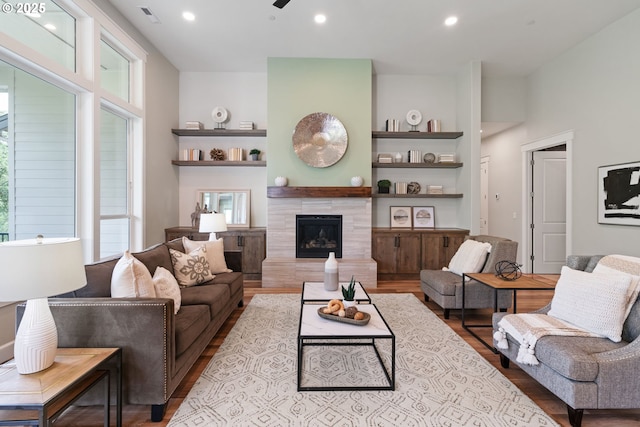 1825 NW Tanner Ct, Camas, WA 98607 - living room with wood finished floors, a tile fireplace, and recessed lighting