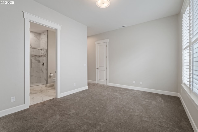 1825 NW Tanner Ct, Camas, WA 98607 - unfurnished bedroom with baseboards, multiple windows, marble look tile flooring, and carpet floors