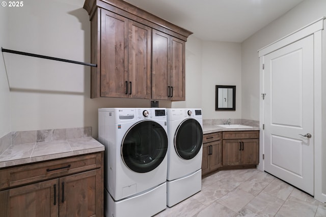 1825 NW Tanner Ct, Camas, WA 98607 - washroom with cabinet space, washing machine and dryer, and light marble finish flooring