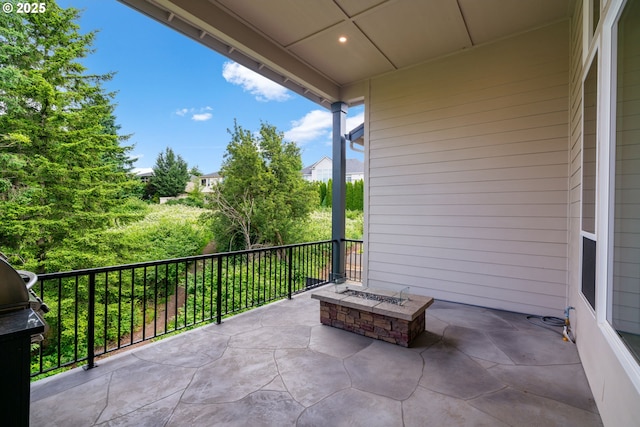 1825 NW Tanner Ct, Camas, WA 98607 - view of patio / terrace with a fire pit