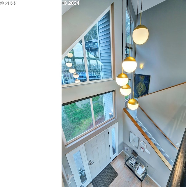 12508 NW Mountain View Rd, Portland, OR 97231 - interior space with wood finished floors and a towering ceiling
