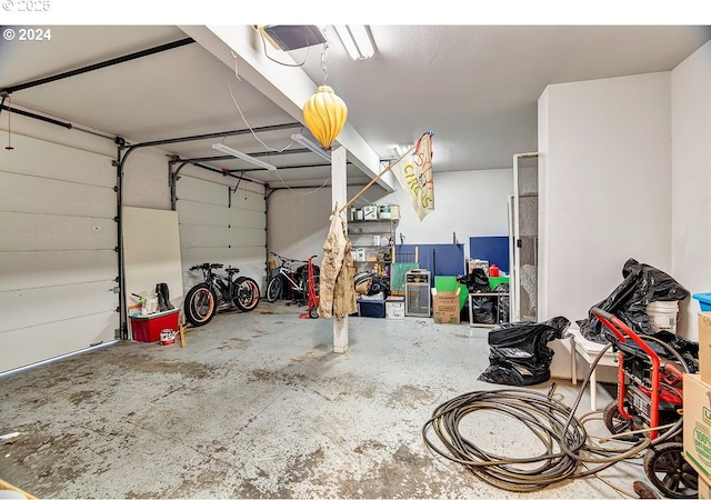 12508 NW Mountain View Rd, Portland, OR 97231 - garage featuring a garage door opener