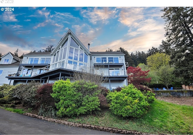 12508 NW Mountain View Rd, Portland, OR 97231 - rear view of house featuring a sunroom