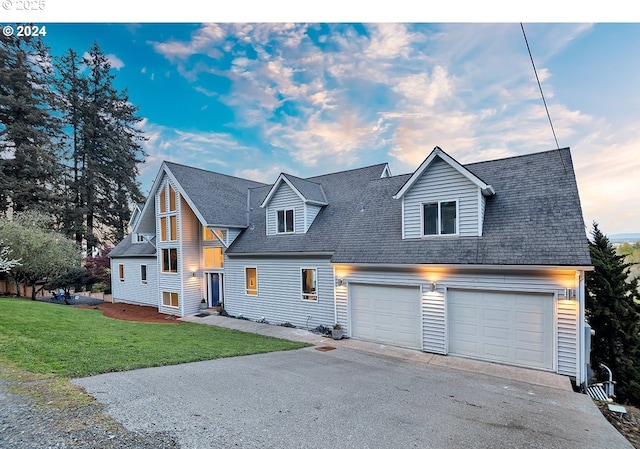 12508 NW Mountain View Rd, Portland, OR 97231 - view of front of property featuring roof with shingles, driveway, a front yard, and a garage
