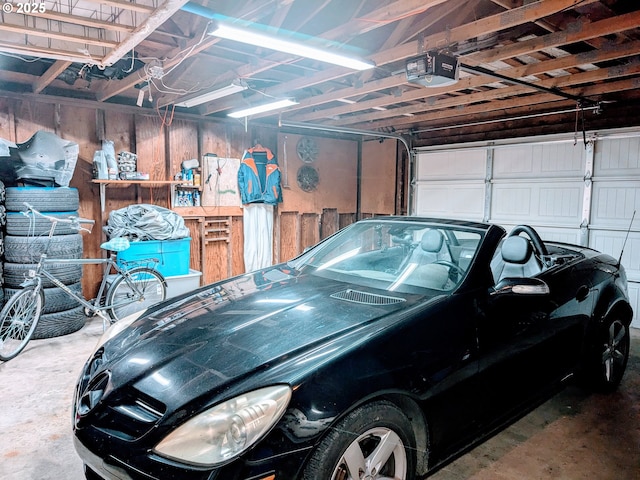 garage featuring a garage door opener