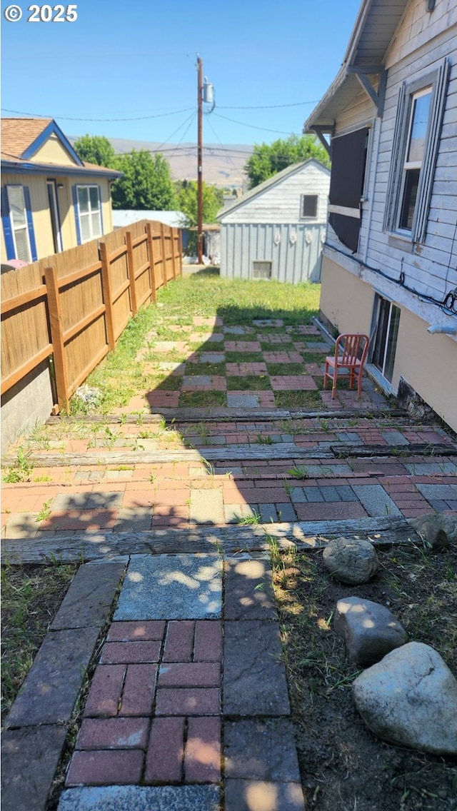 505 E 13th St, The Dalles, OR 97058 - view of yard featuring a patio area