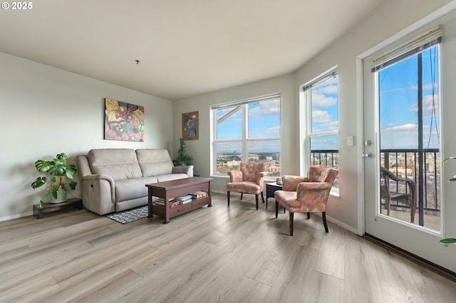 410 NW Uptown Ter Unit 3-B, Portland, OR 97210 - living area with light wood-style flooring and baseboards