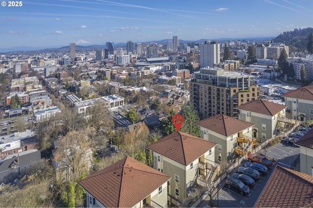 birds eye view of property featuring a view of city