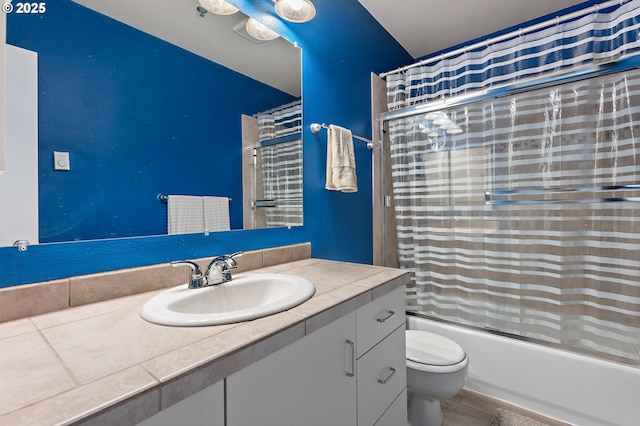 410 NW Uptown Ter Unit 3-B, Portland, OR 97210 - bathroom featuring vanity, shower / bath combo with shower curtain, and toilet