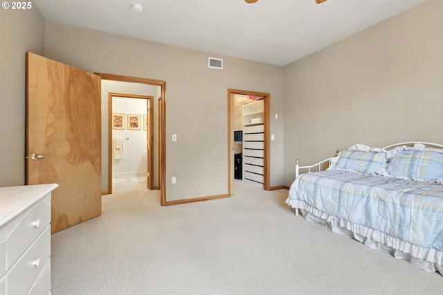 2024 SW Howards Way, Portland, OR 97201 - bedroom featuring light carpet and a walk in closet