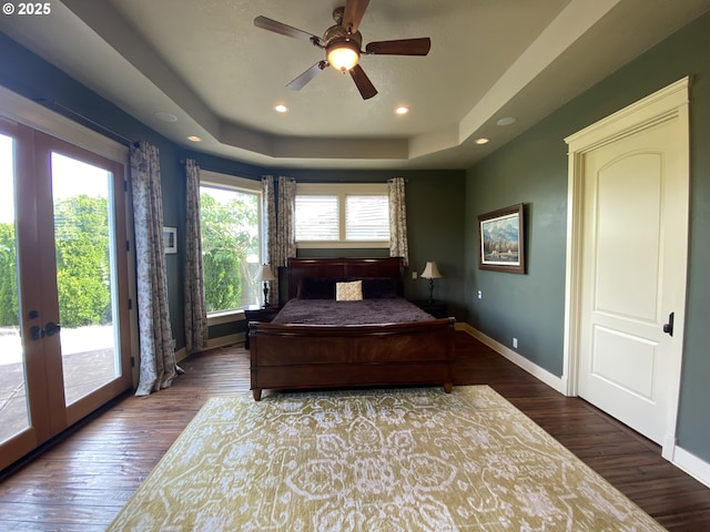 625 St Andrews Loop, Creswell, OR 97426 - bedroom with access to outside, baseboards, wood finished floors, a raised ceiling, and recessed lighting