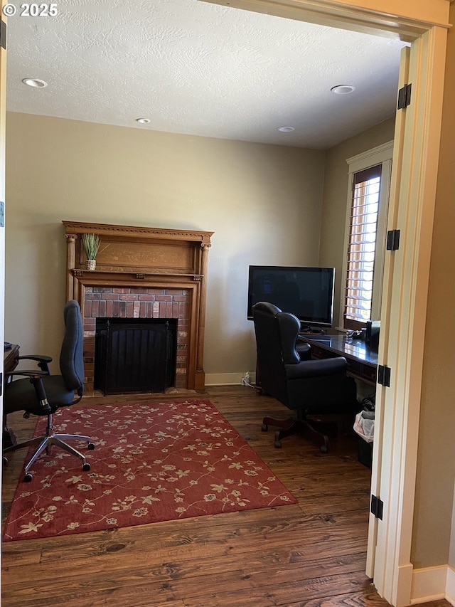 625 St Andrews Loop, Creswell, OR 97426 - office space with wood finished floors, a fireplace, and baseboards