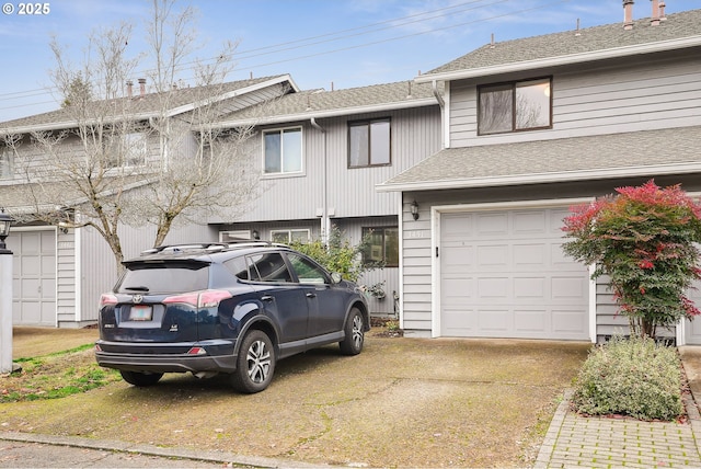 view of property featuring a garage