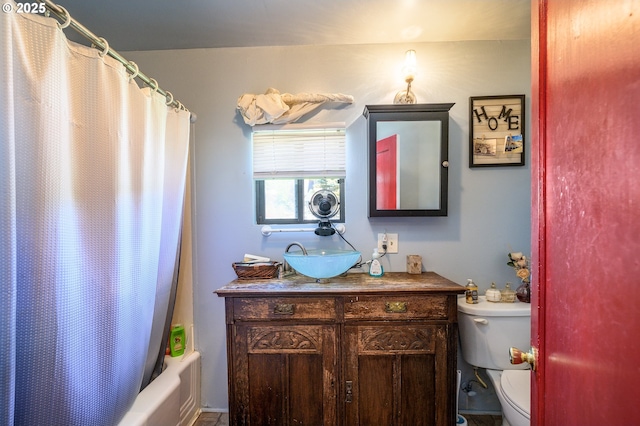 103 NW 4th St, Willamina, OR 97396 - full bath with toilet, vanity, and shower / bath combo with shower curtain