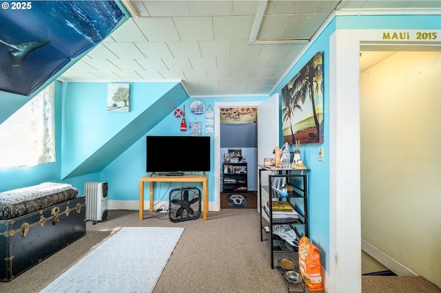 103 NW 4th St, Willamina, OR 97396 - carpeted living area featuring radiator and baseboards