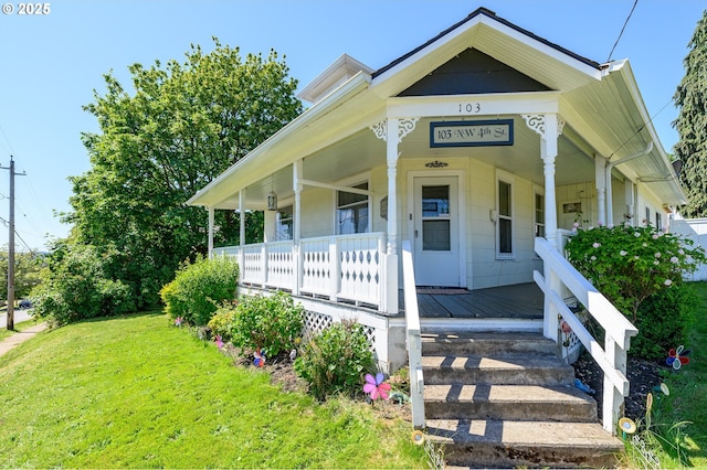 103 NW 4th St, Willamina, OR 97396 - view of front of house with covered porch and a front lawn