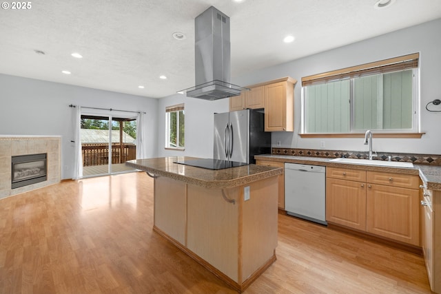 651 NE Anderson Rd, Gresham, OR 97030 - kitchen with dishwasher, freestanding refrigerator, island range hood, light brown cabinetry, and black electric cooktop