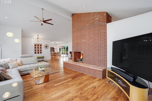 34926 SW Johnson School Rd, Cornelius, OR 97113 - living area featuring a fireplace, light wood-style floors, ceiling fan, beamed ceiling, and high vaulted ceiling