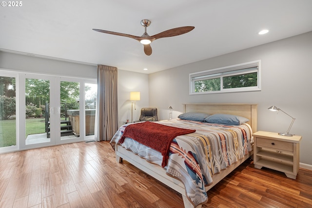 34926 SW Johnson School Rd, Cornelius, OR 97113 - bedroom featuring access to outside, wood finished floors, recessed lighting, and ceiling fan