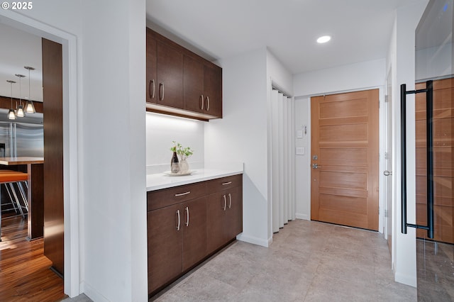 34926 SW Johnson School Rd, Cornelius, OR 97113 - kitchen featuring dark brown cabinetry, light countertops, and recessed lighting