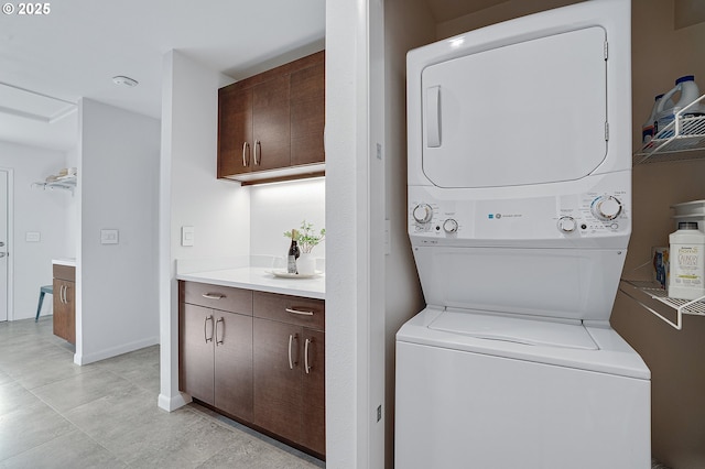 34926 SW Johnson School Rd, Cornelius, OR 97113 - laundry area with stacked washing machine and dryer and baseboards