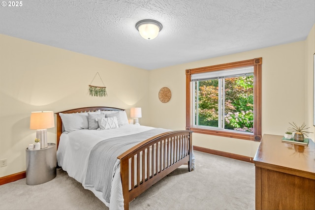 3147 SE Belmont St, Portland, OR 97214 - bedroom with light carpet and a textured ceiling