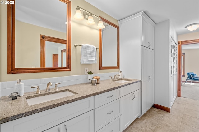 3147 SE Belmont St, Portland, OR 97214 - bathroom with double vanity and tile patterned floors