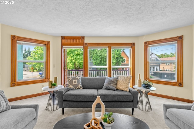3147 SE Belmont St, Portland, OR 97214 - living room featuring light colored carpet, healthy amount of natural light, and a textured ceiling