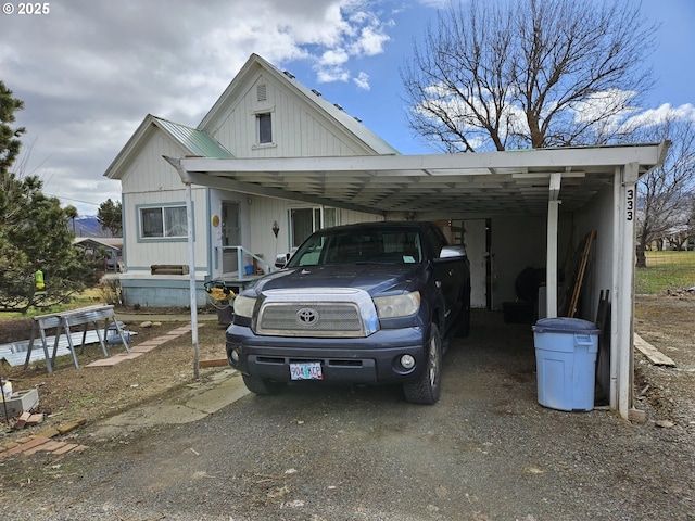 333 3rd St, Richland, OR 97870 - view of front of property featuring an attached carport, driveway, and board and batten siding